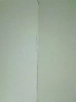 Picture of drywall corner cracking due to failed fasteners