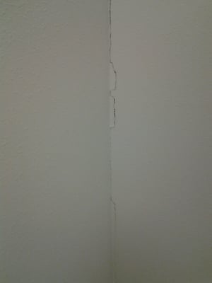 Picture of drywall inside corner cracking due to improper backing