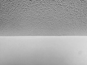 Photo of Popcorn Drywall Texture on the ceiling and smooth walls