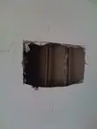 Picture of hole drywall hole for copper pipe access