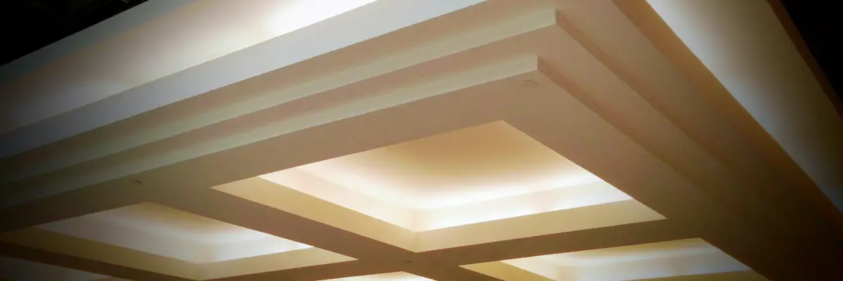 Photograph of floating drywall soffits with dramatic lighting