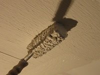 rolling drywall mud with paint roller