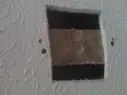 picture of strapped backing drywall patch