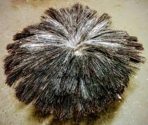 Picture of a Rosebud Drywall Texture brush from the bottom, highlighting the bristles