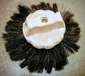 Photo of a Rosebud Drywall Texture Brush from the top side, showing where the handle connects