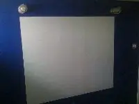 Picture of whiteboard painted on dark blue children's room wall